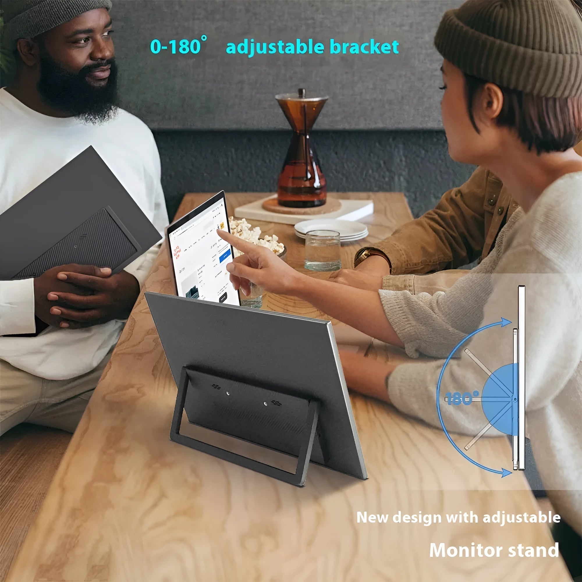 Black 15.6-inch portable LCD monitor on an adjustable stand with HDMI and USB cables.