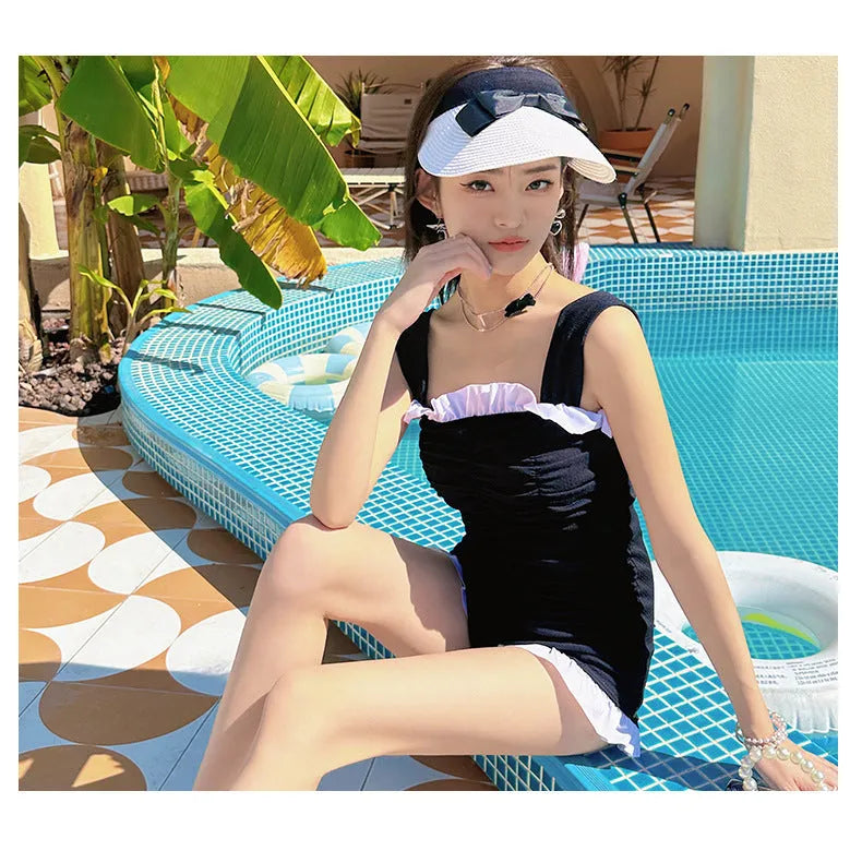 Women's black one-piece swimsuit jumpsuit with suspender straps for swimming