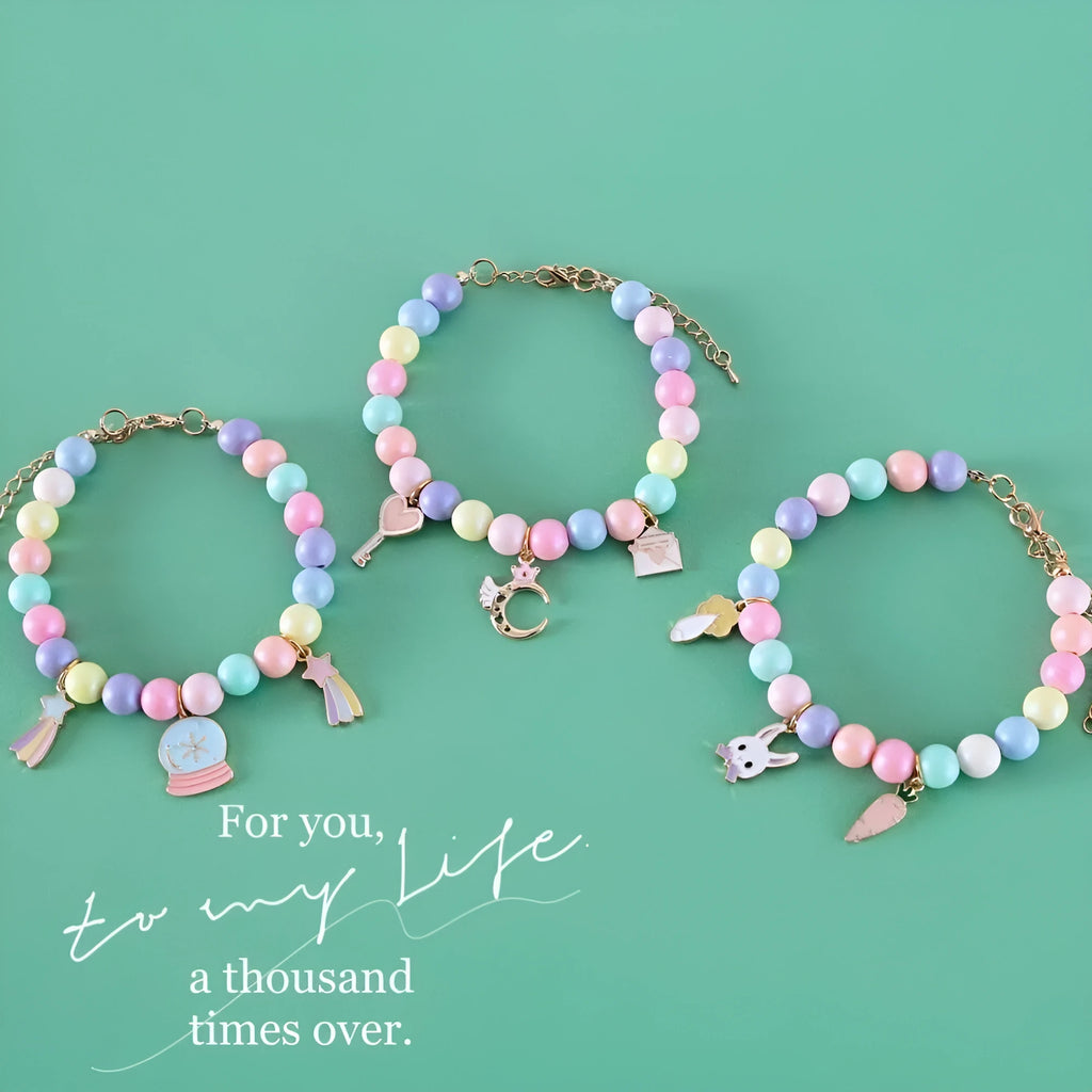 Macaron-coloured resin pet collar with moon charm and matching adjustable bracelet for cats or small dogs.