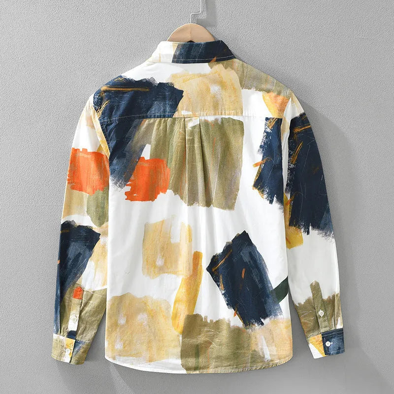 Women's printed colour cotton long sleeve loose cardigan on a hanger.