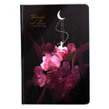 A5 size notebook with a luminous reflective cover, open to show internal pages with colour illustrations.