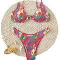 Red floral underwire bikini top and briefs on a white background.