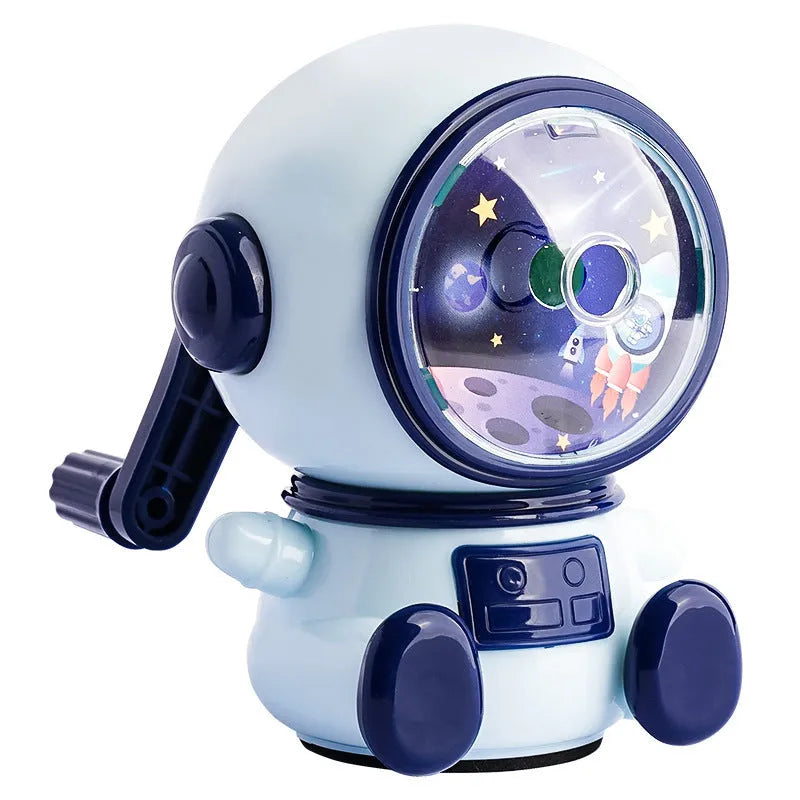 Blue astronaut cartoon manual pencil sharpener for children on a white background