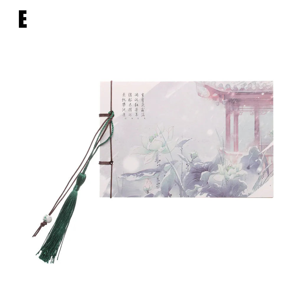 Blank kraft paper notebook with hand-stitched binding and decorative tassel in 12x14.5cm size
