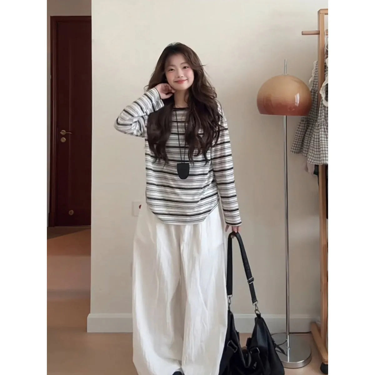 Black stripes long sleeve relaxed fit polyester T-shirt with sun protection, front view