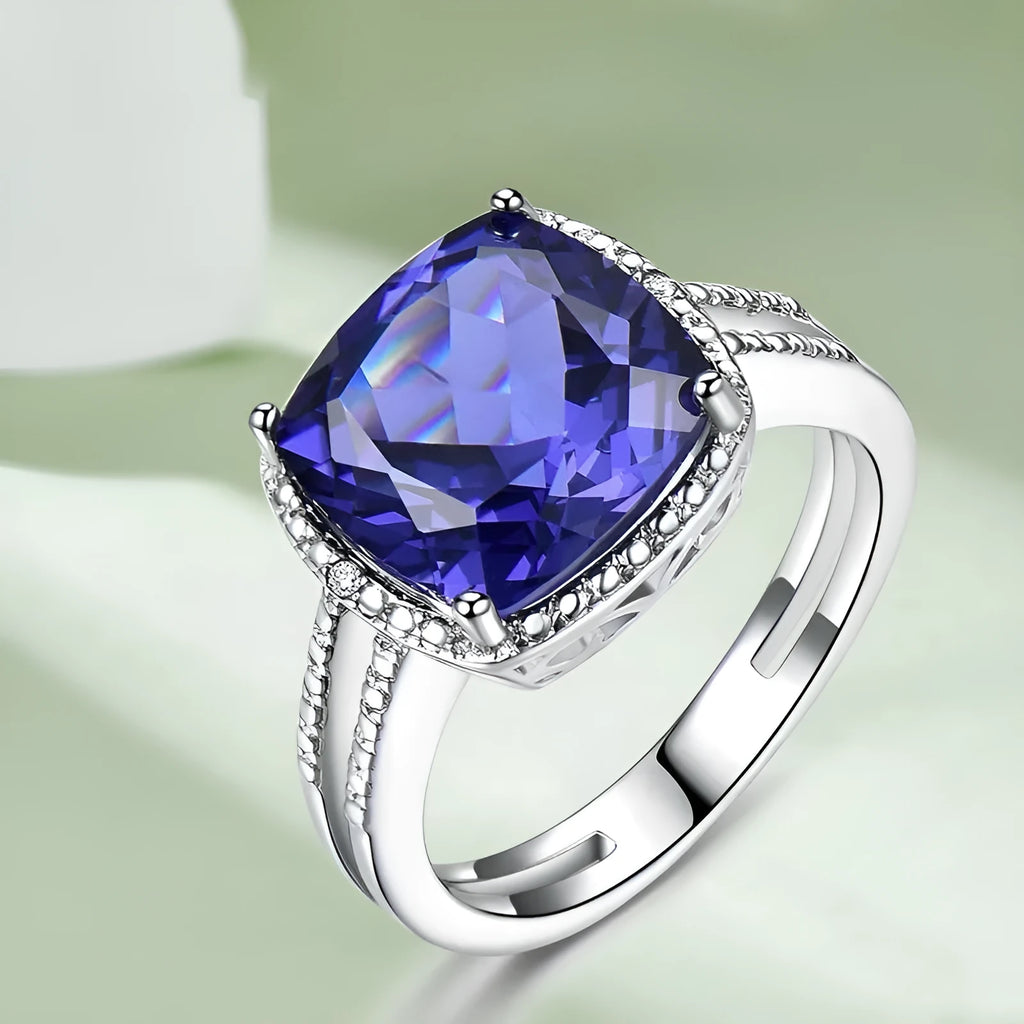 Blue tanzanite stone set in sterling silver women's ring with alloy accessory
