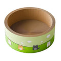 Large round deep pit cat scratch board made of brown corrugated paper on a wooden floor.
