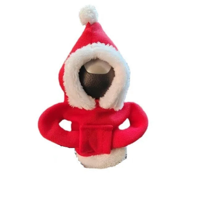 Knitted gear lever hooded sweater with coloured pom poms on car gearstick