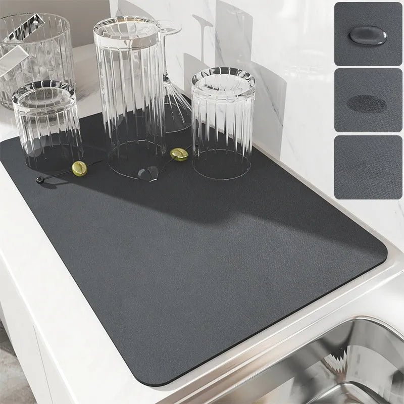 Square super absorbent drain mat with rubber backing in black or blue on a kitchen counter.