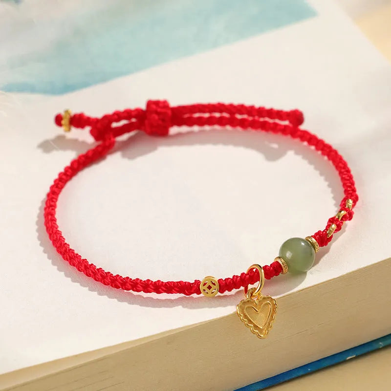Women's handmade 925 silver and Hetian jade bracelet with adjustable woven cord strap