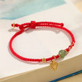 Women's handmade 925 silver and Hetian jade bracelet with adjustable woven cord strap