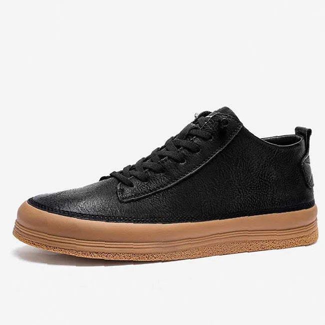 Men's black leather casual shoes with round toe, flat heel, and laced closure on soft rubber sole