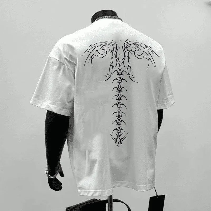 A man wearing a loose-fit black pure cotton short sleeve t-shirt, suitable for business casual settings.