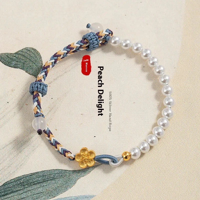 Peach coloured adjustable cord bracelet with Chinese flower weaving and sterling silver chalcedony accents