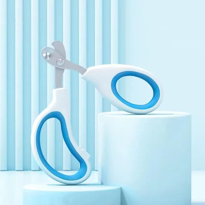 Blue cat nail clippers with circular cut hole and cushioned non-slip handle
