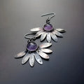 Purple bohemian earrings with resin gemstone details and animal or zodiac modelling