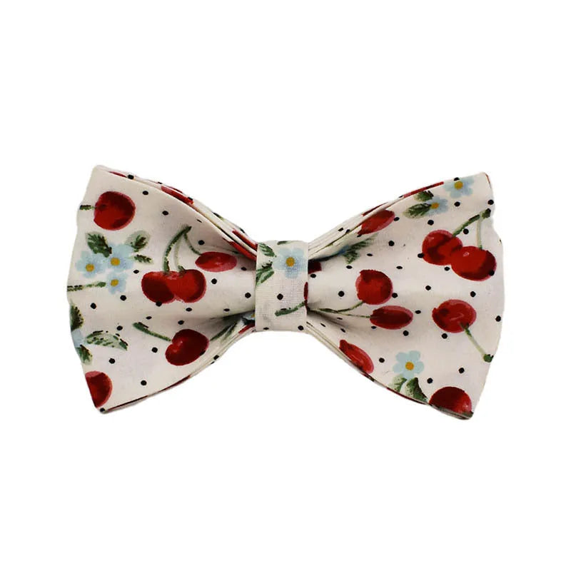 Red cherry print dog collar and leash set with light gold metal buckle and attached cloth bow