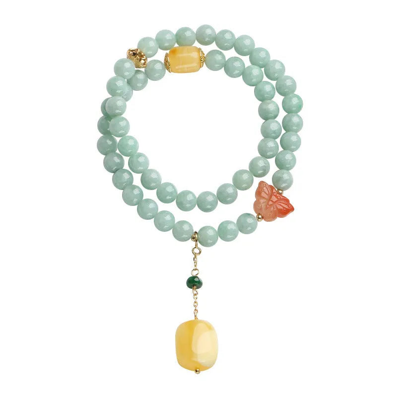 Double-layer retro bracelet with emerald jade round beads and hanging beeswax barrel beads.