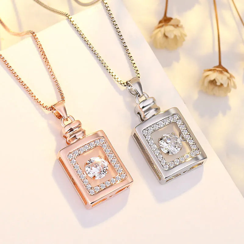 Silver love heart-shaped copper pendant necklace with crown and bow details for women