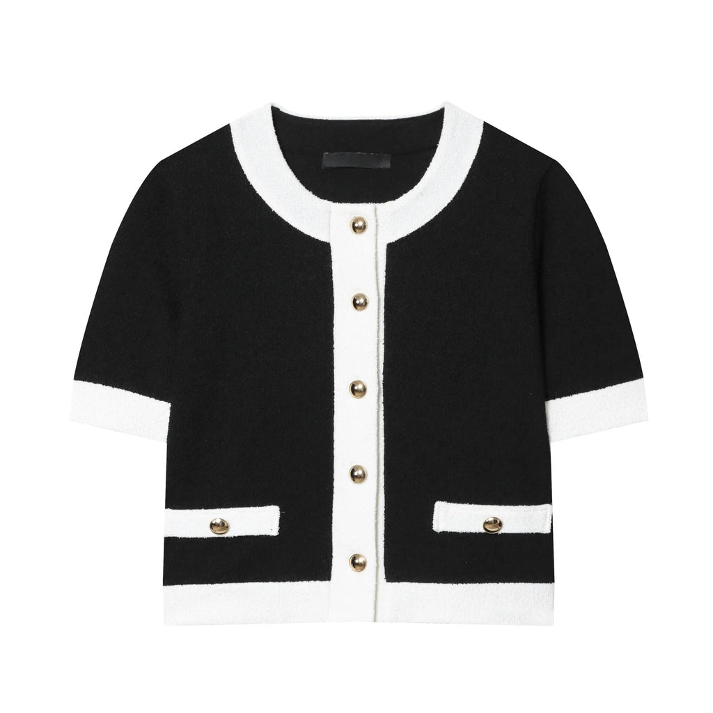 Women's casual two-piece suit set with beaded leather detail on top and high-waisted trousers.