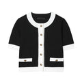 Women's casual two-piece suit set with beaded leather detail on top and high-waisted trousers.