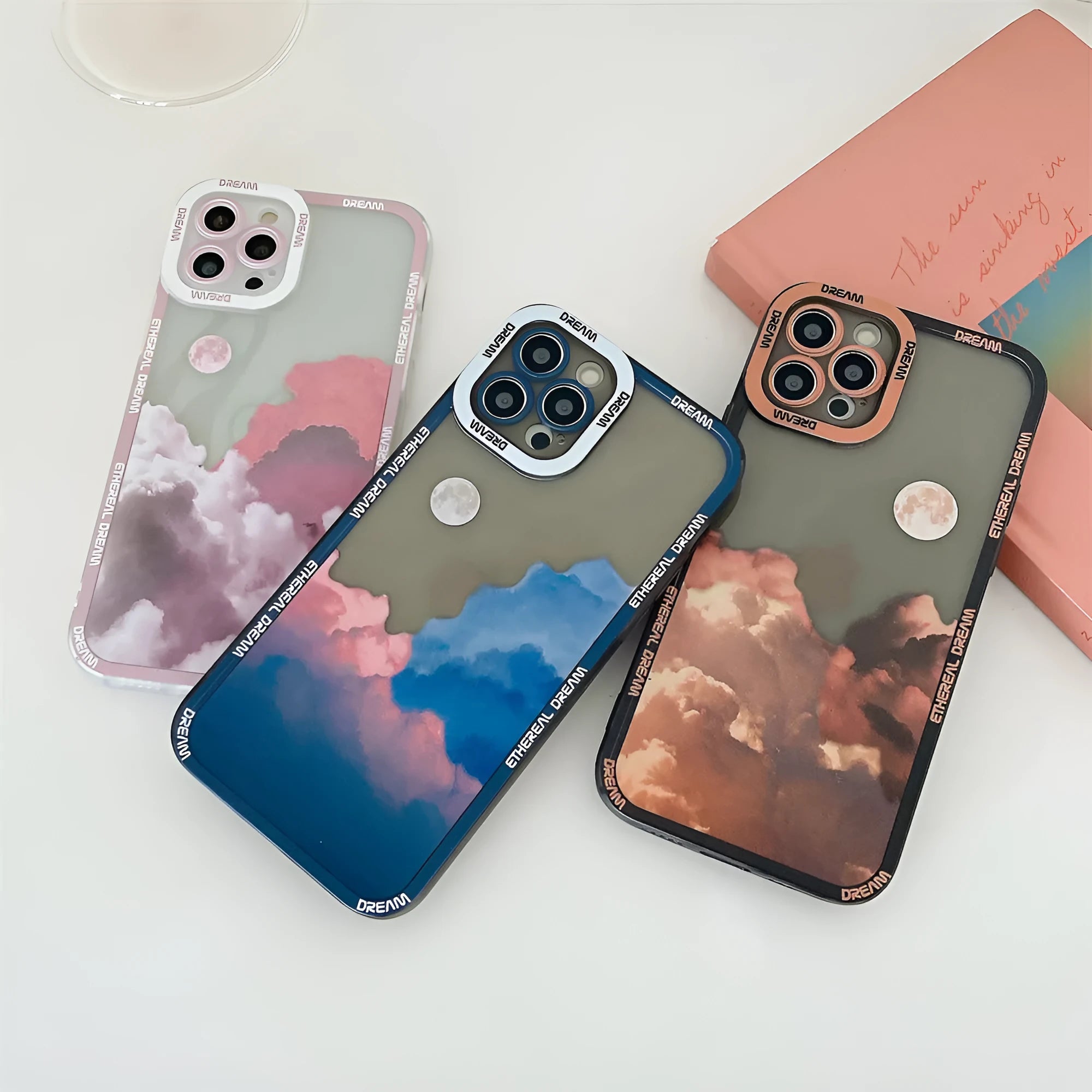 Sunset clouds design TPU protective back case for iPhone on a table.