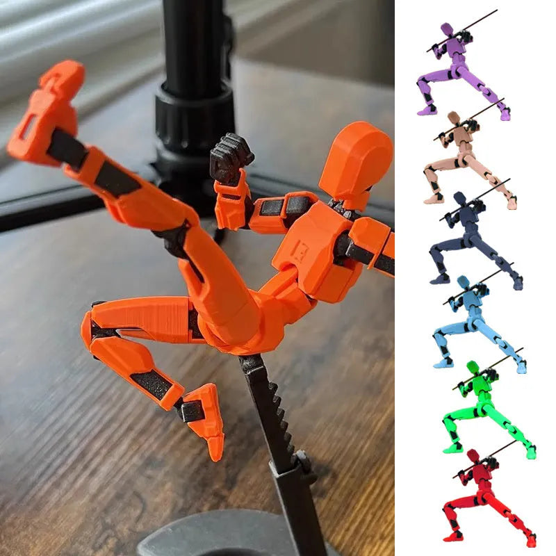 Multi-jointed 3D printed robot action model with movable limbs on a desk.