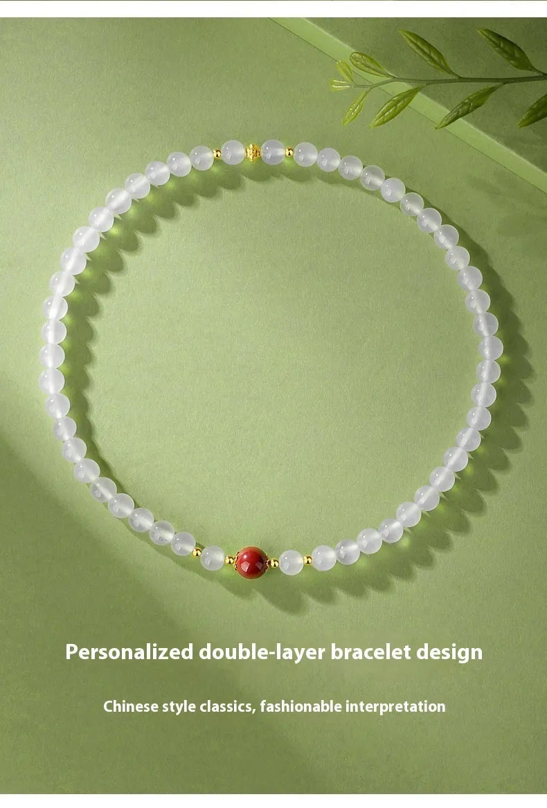 Double layer white agate women's bracelet with geometric 6mm beads and jequirity bean cinnabar details