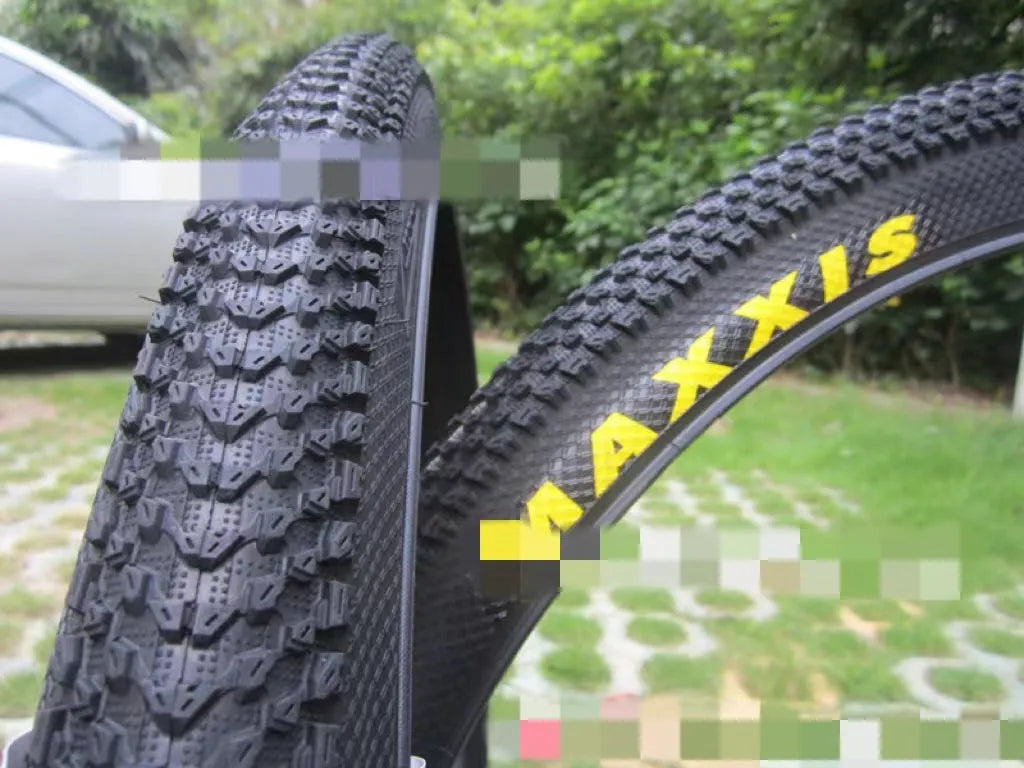 Mountain bike ultralight puncture-proof tyre shown in multiple sizes for 26, 27.5, and 29-inch wheels.
