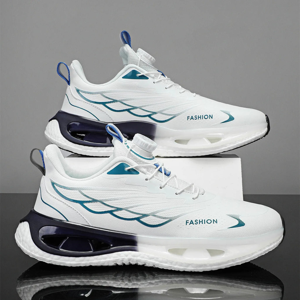 Low top youth sneaker with rotating button fastener in light blue, black, or white and blue colourways.