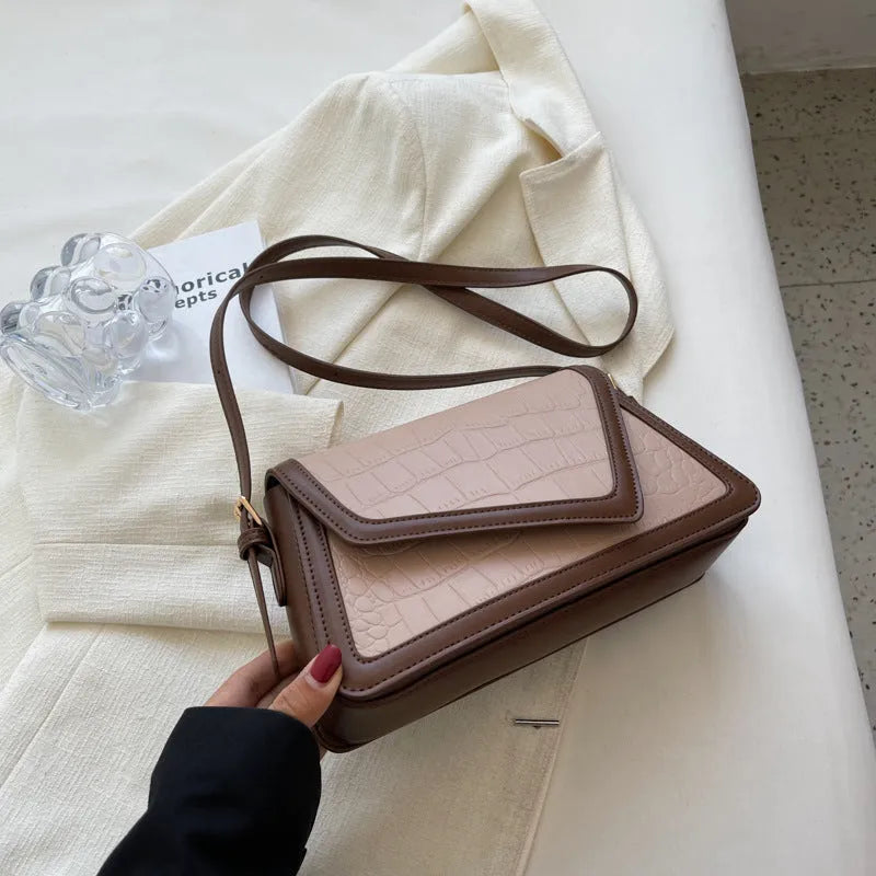 Stone pattern PU leather square shoulder bag in beige, shown with one-shoulder strap.