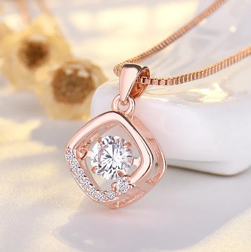 Silver love heart-shaped copper pendant necklace with crown and bow details for women
