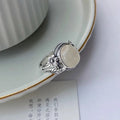 Copper vintage ring with adjustable opening and white chalcedony imitation colour
