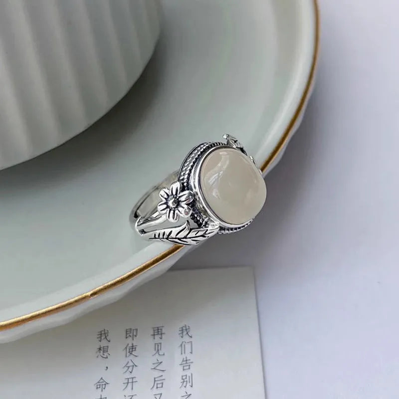 Copper vintage ring with adjustable opening and white chalcedony imitation colour