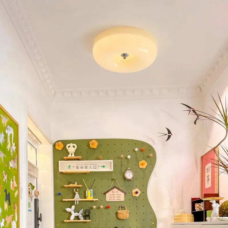 Cream coloured American antique style bedroom ceiling lamp with a three-colour light.
