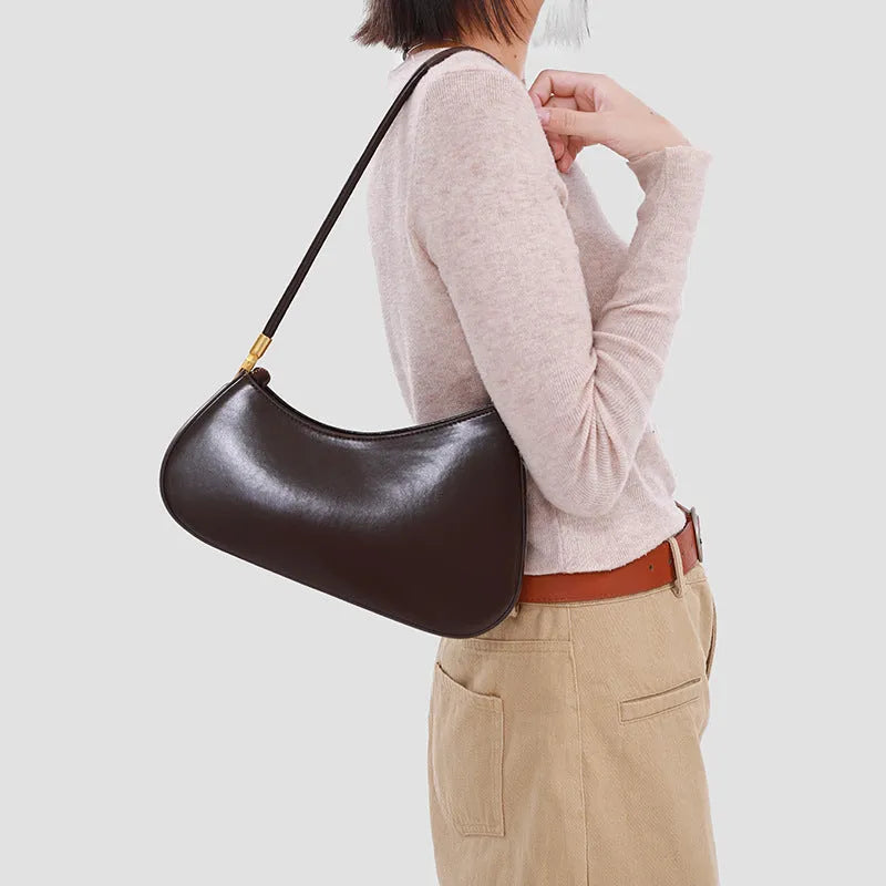Women's retro PU leather underarm bag in oval shape with single shoulder strap and sandwich pocket