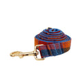 Four-piece dog accessory set with collar, leash, bow tie, and cloth vest in cloth fabric