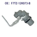 Ford camshaft position sensor part F7TZ12K073B on a plain background.