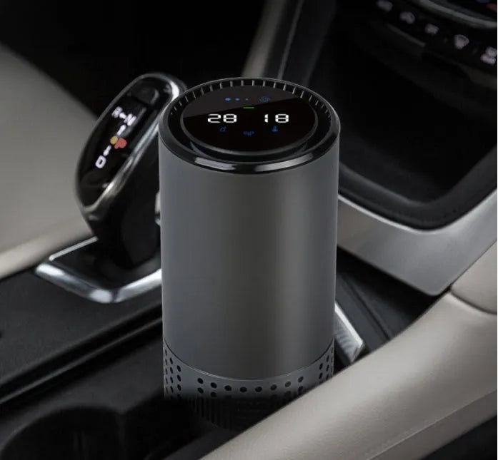 Aluminium alloy car cup holder air purifier with USB cable and negative ion generator display.