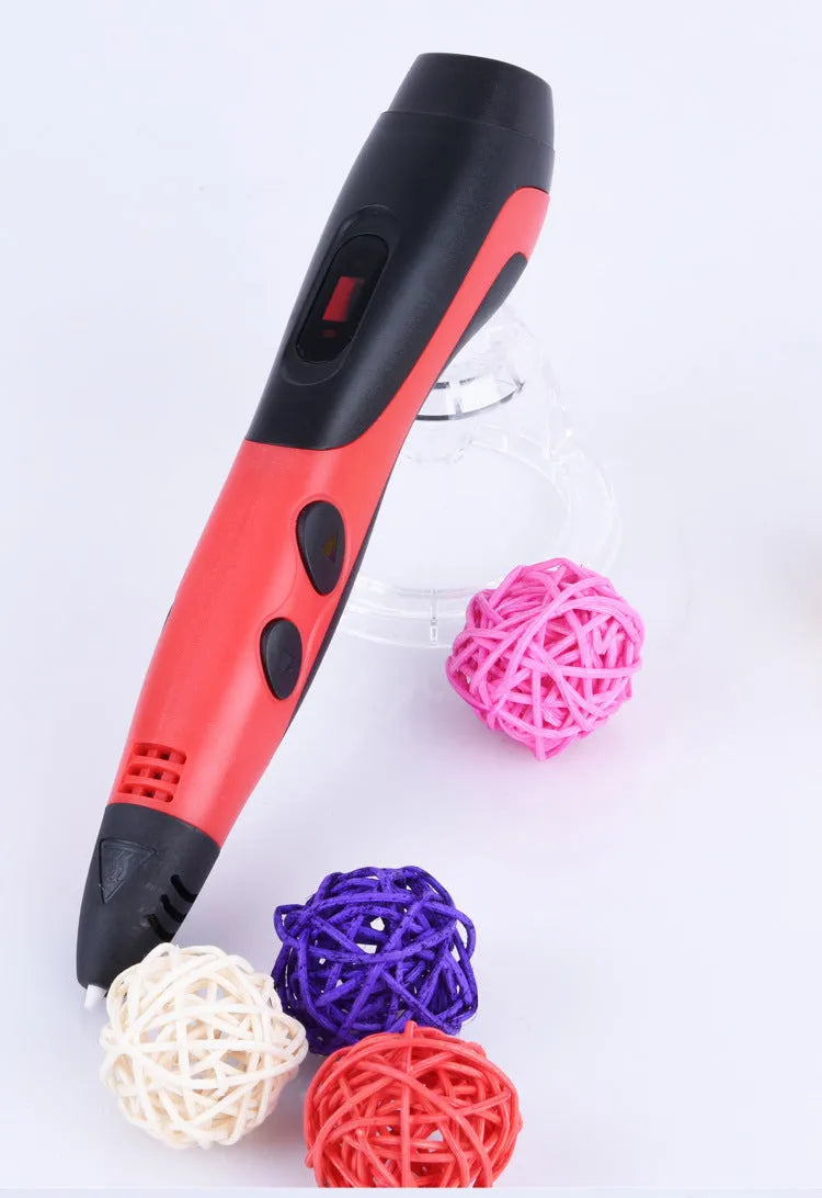 3D printing pen with plastic body, USB cable, and accessories including base and 12-colour filaments