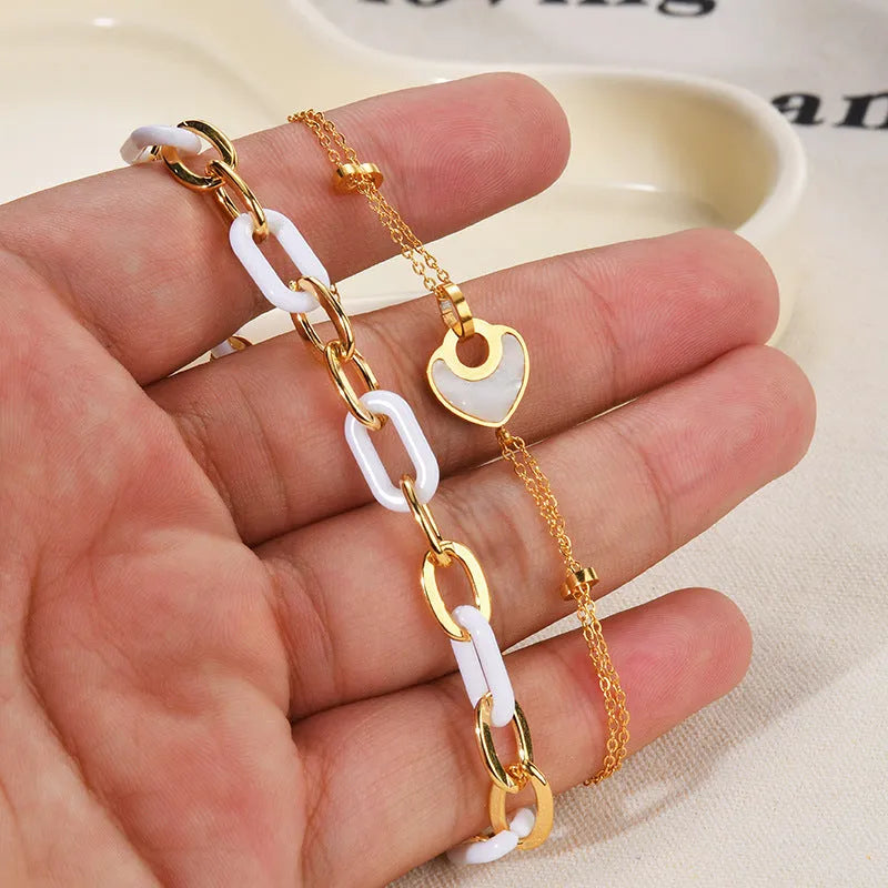Women's stainless steel heart bracelet with double layers and electroplated resin finish