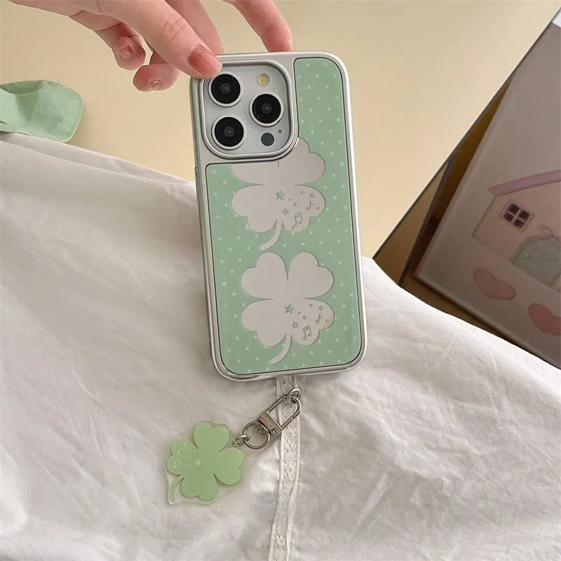 Acrylic mirror phone case with four-leaf clover pattern for iPhone 16 Pro Max