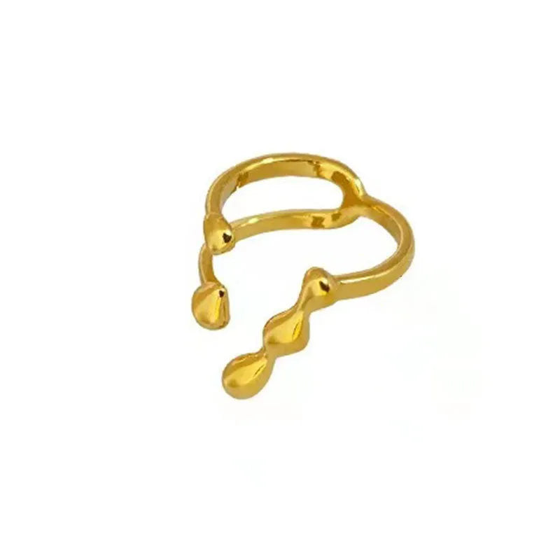 Brass opening ring with spherical design in gold or silver colour options