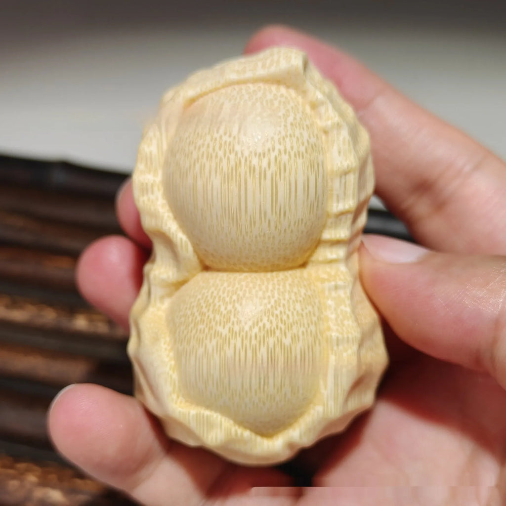 Solid bamboo carving peanut ornament with good things may happen inscription modern simplicity design