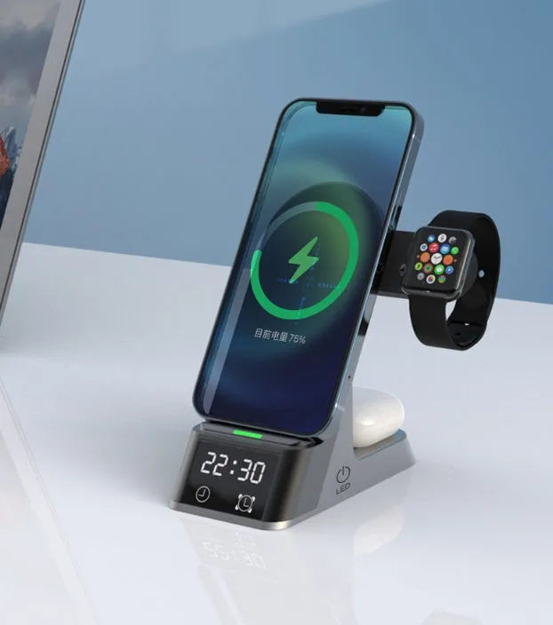 Black multifunctional alarm clock with wireless charging pad, smartwatch dock, and USB port.