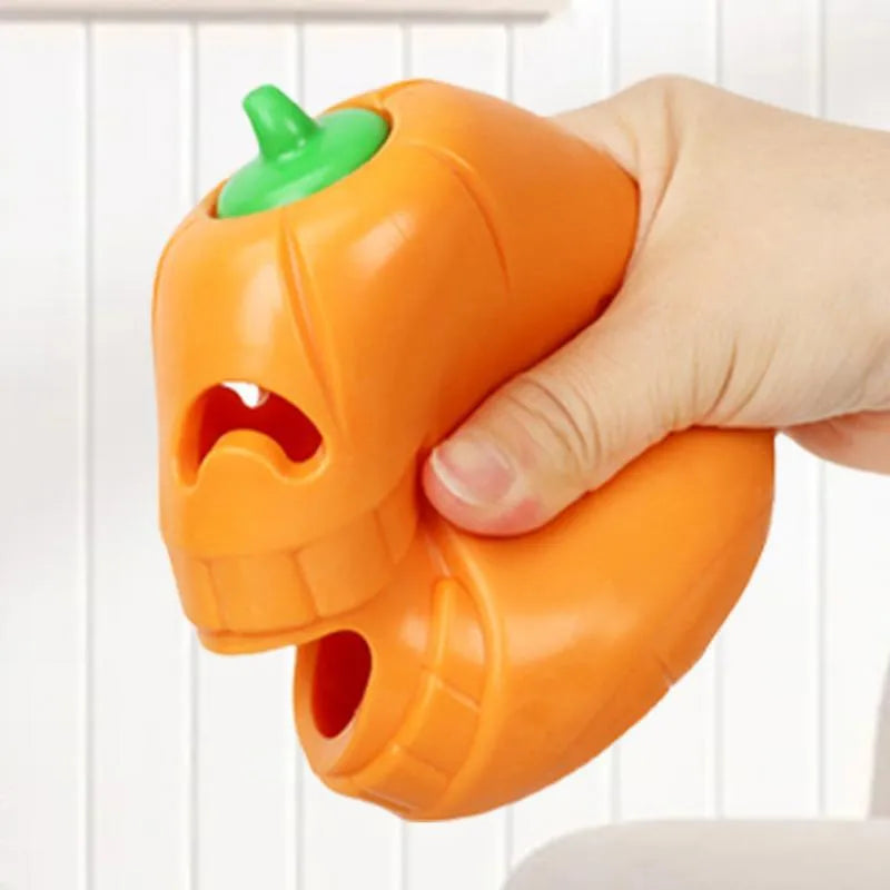 Yellow pumpkin-shaped TPR dog chew toy measuring 8.6x11.5cm