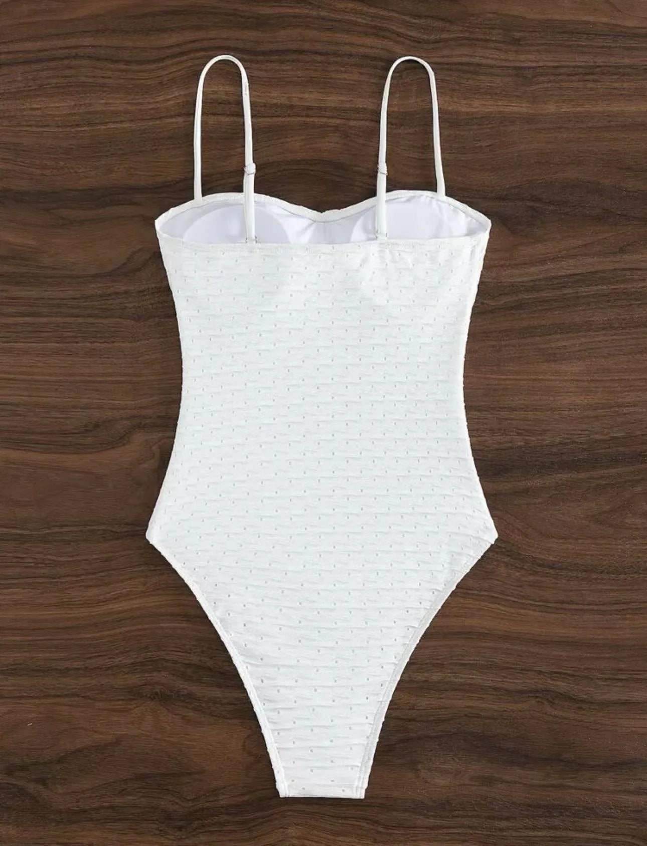 White polyester one-piece swimsuit for women with briefs style and sling design
