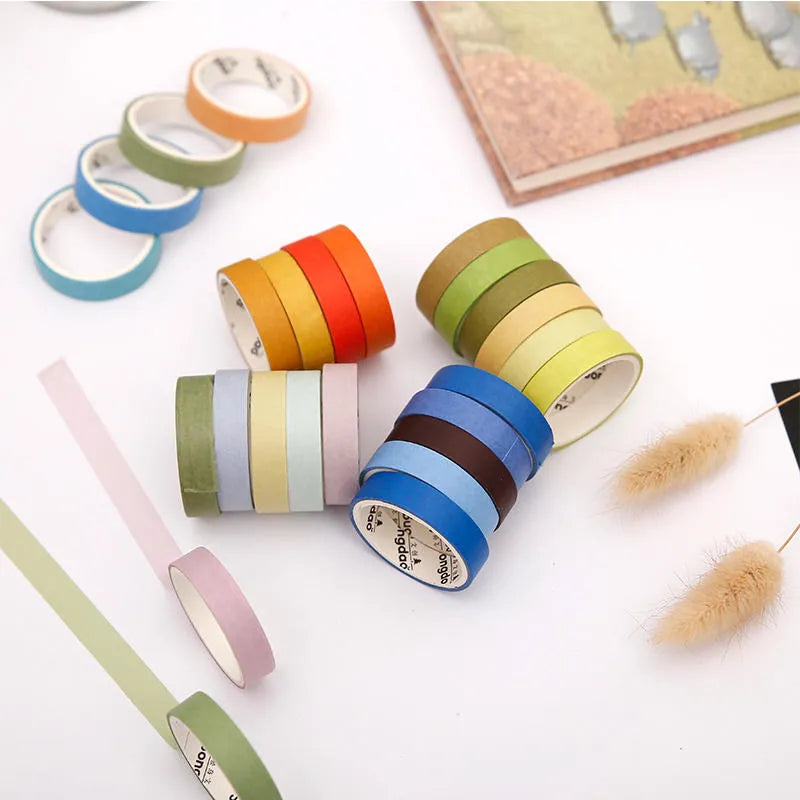 Six rolls of 9mm wide decorative tape with 24 solar term designs on and paper for journaling