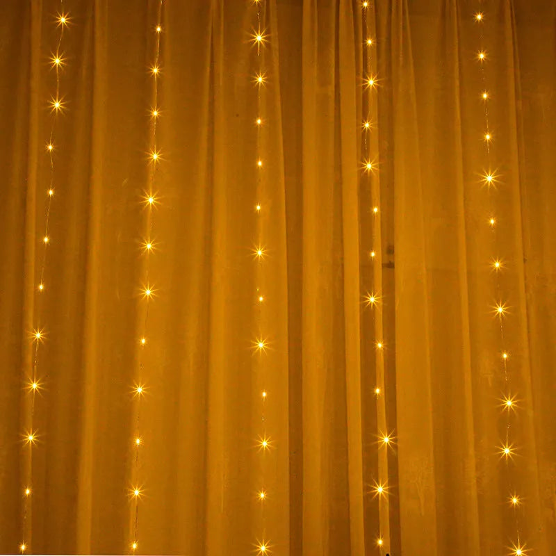 Copper curtain style LED string Christmas lights with USB plug, shown in warm white colour