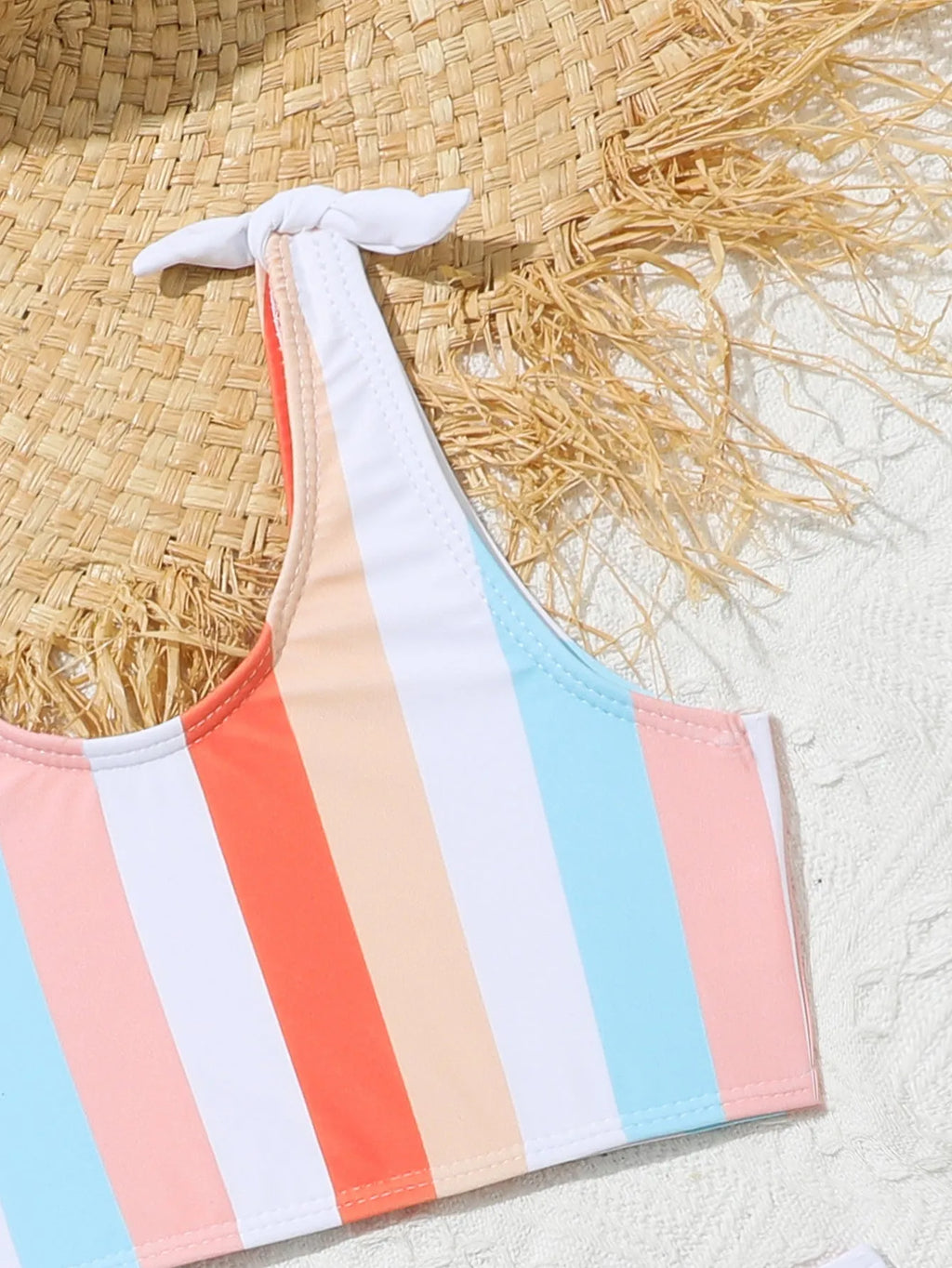 Girls' plaid print two-piece swimsuit set with bra top and briefs for swimming.